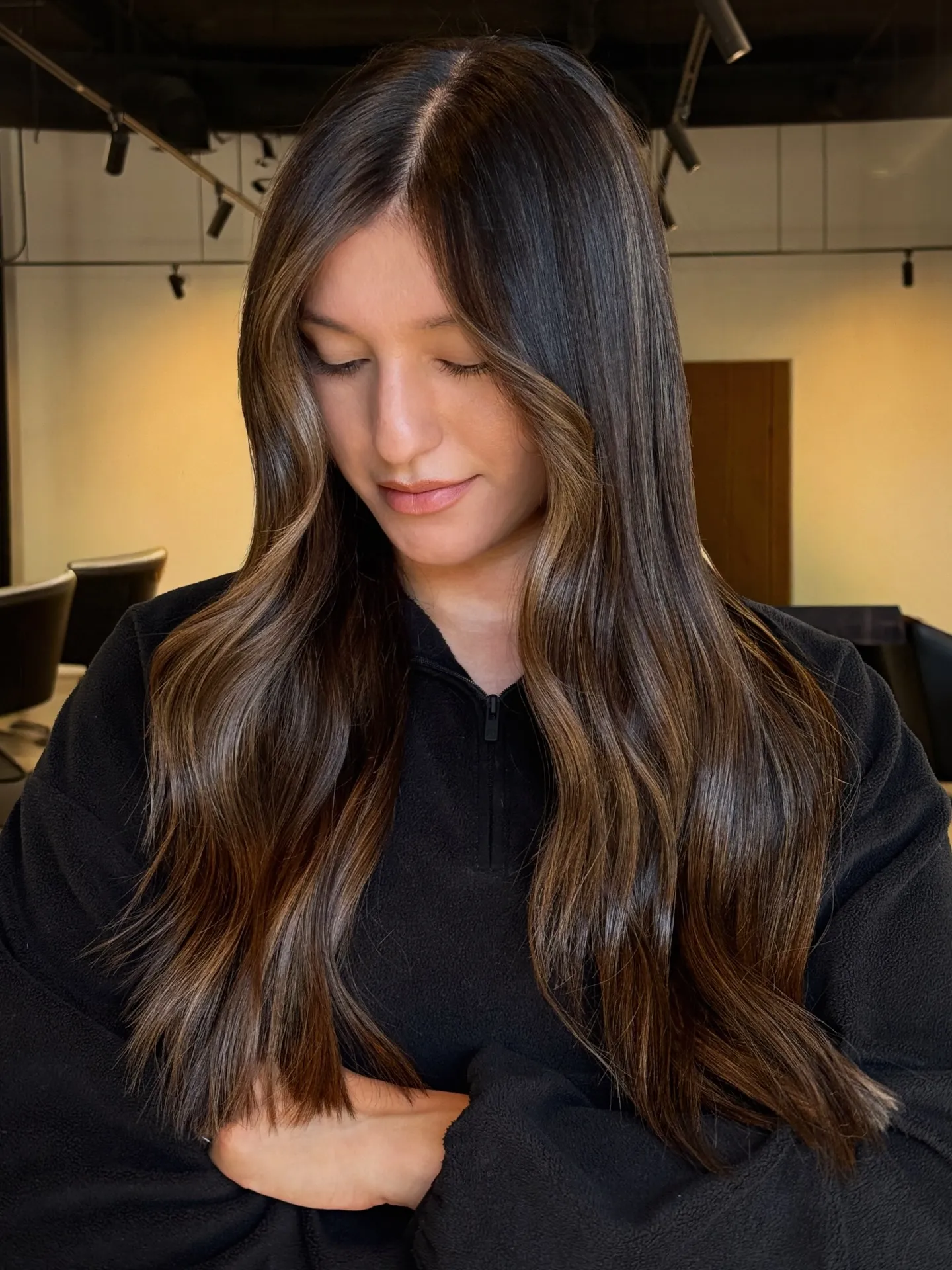 Long brunette hair with soft ribbon highlights