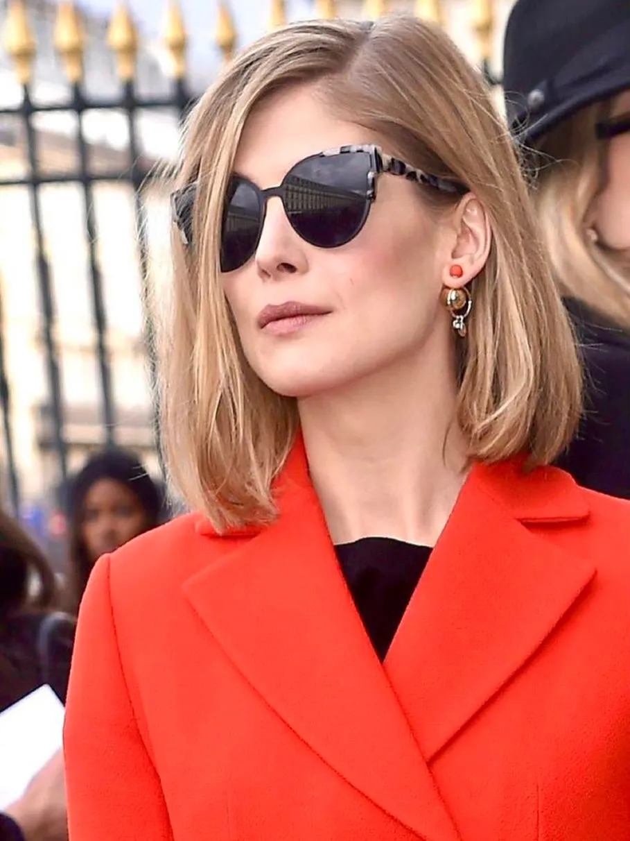 Sleek blonde blunt bob with side part