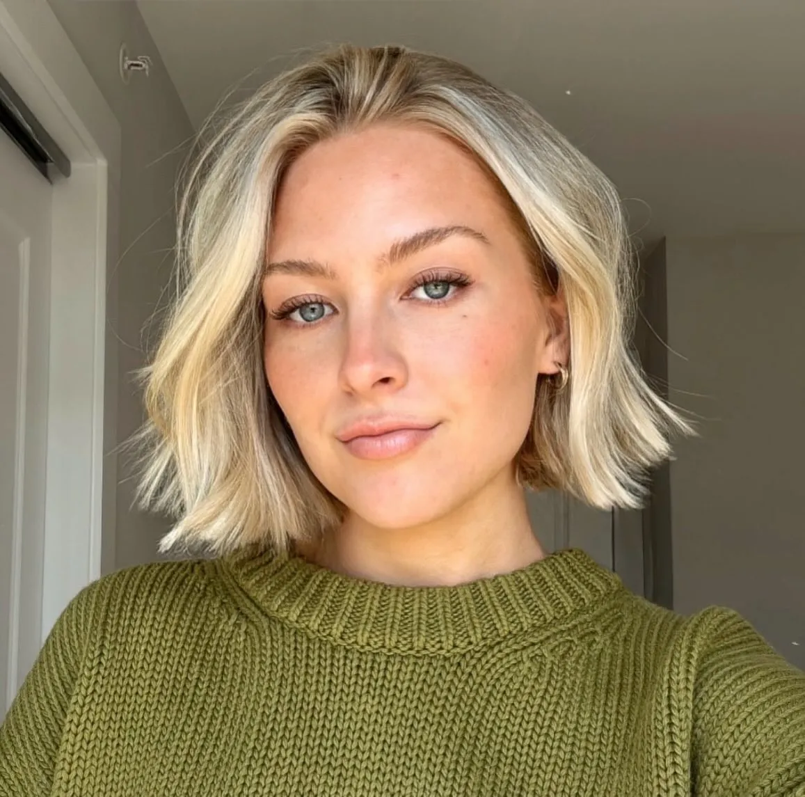 Short blonde bob with flipped ends