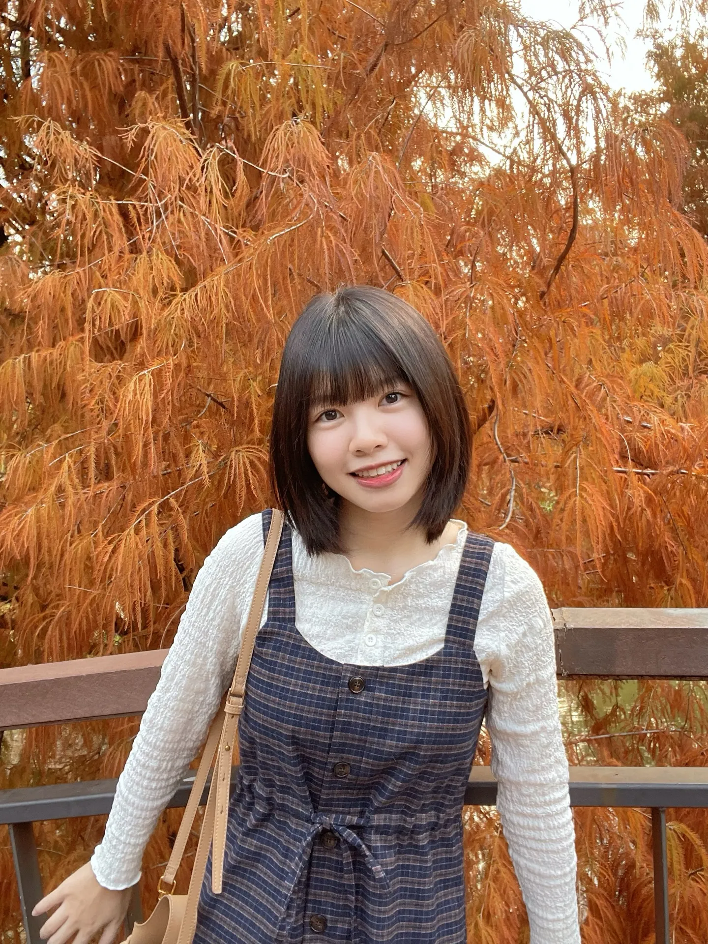 Straight dark bob with full bangs