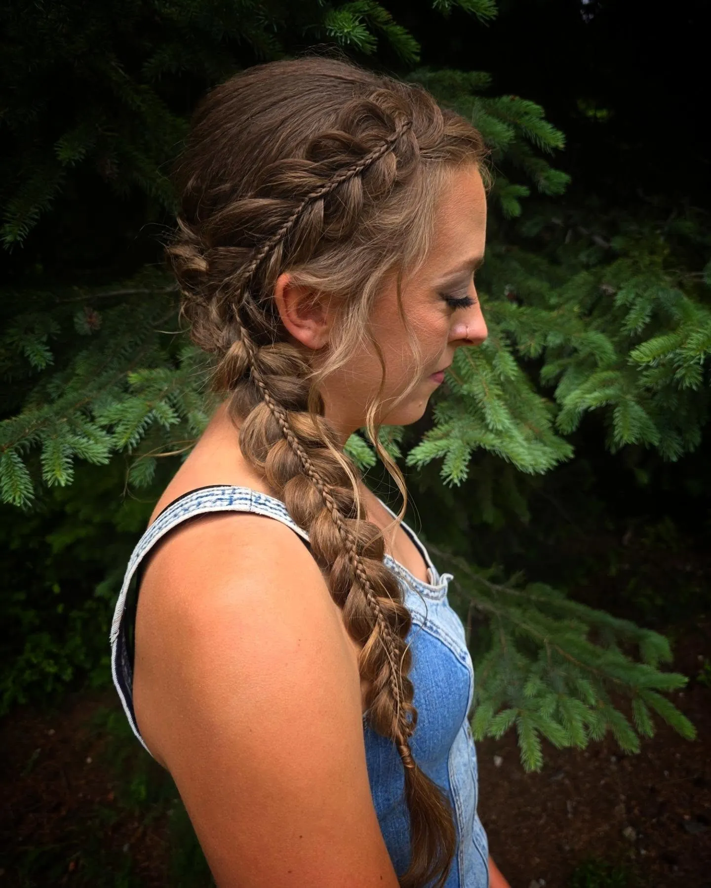 Looped half-up braid crown with small braided details