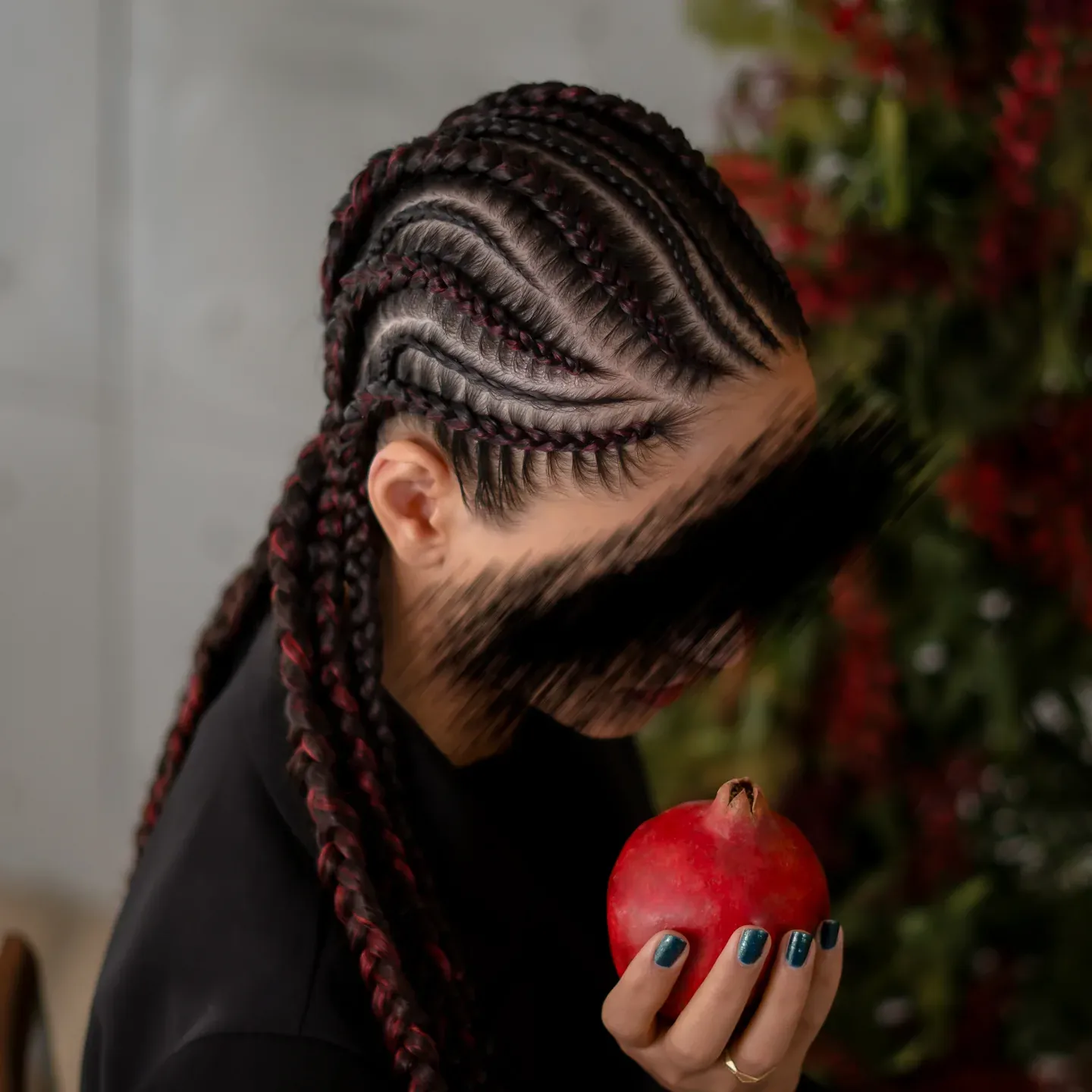 Woven half-up braid with decorative metal chain