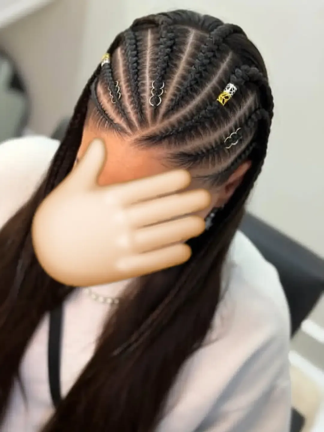 Chunky multi-braid updo pinned across the back