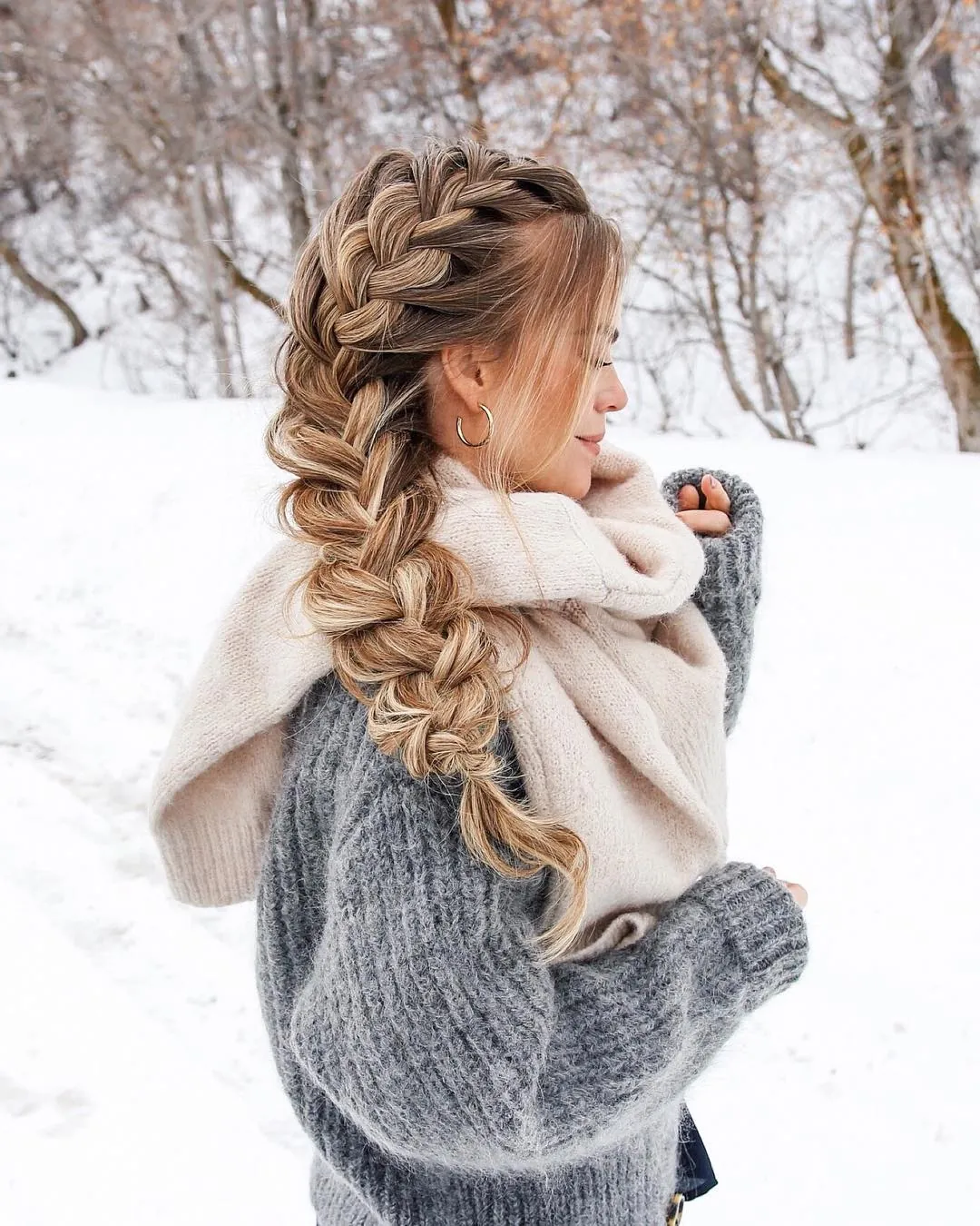 Half-up center braid with curled long hair