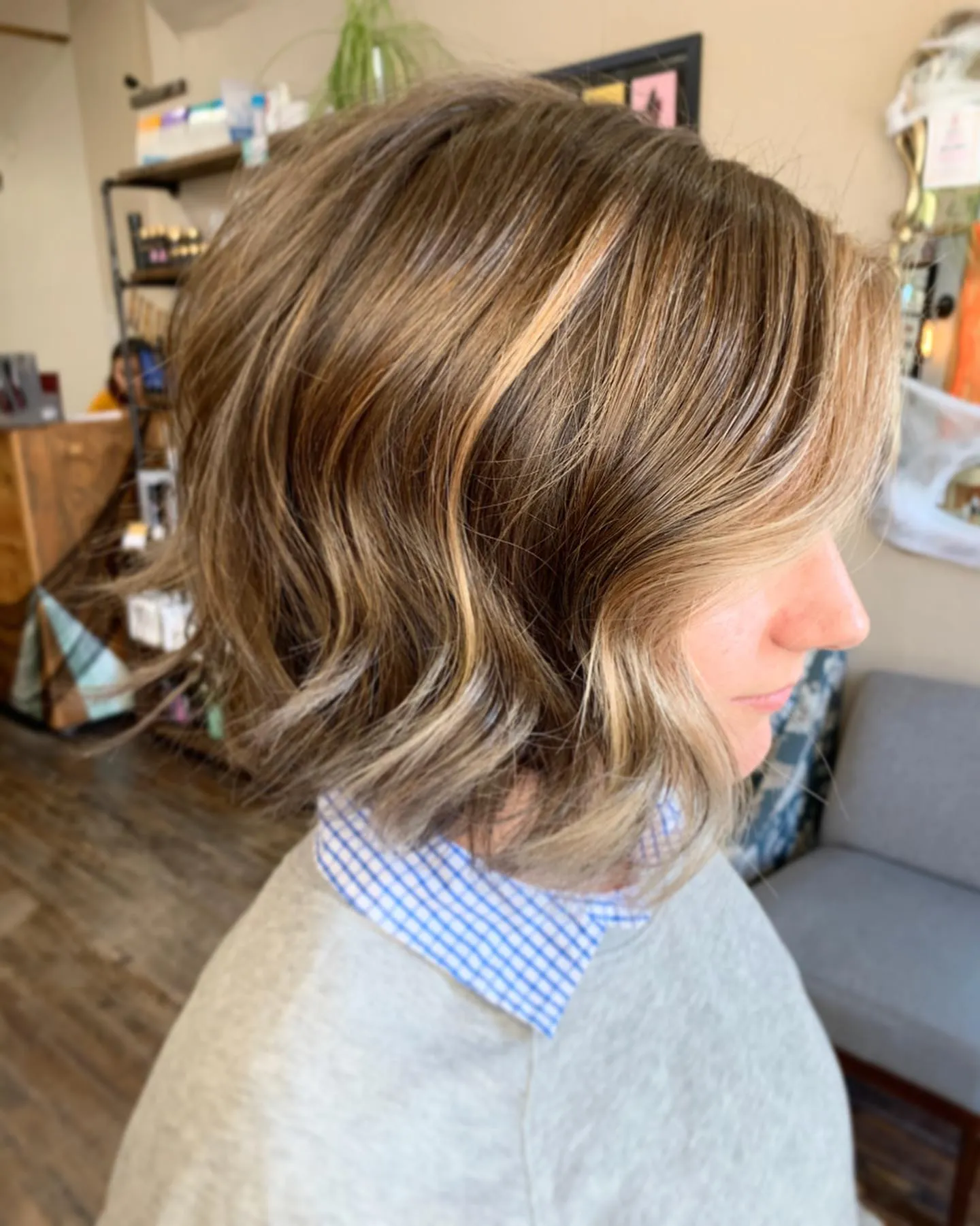 Short wavy bob with lighter face framing
