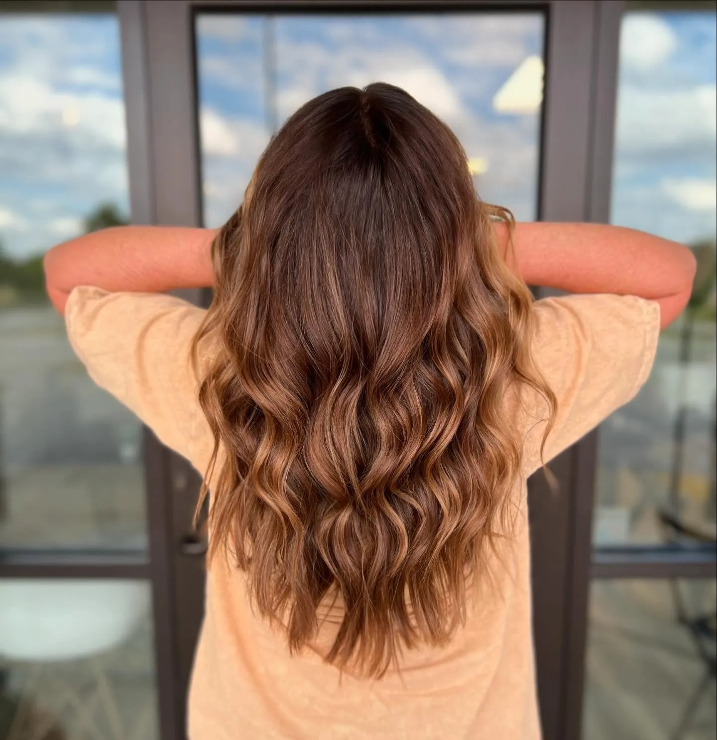 Long brown with lighter ends and soft waves