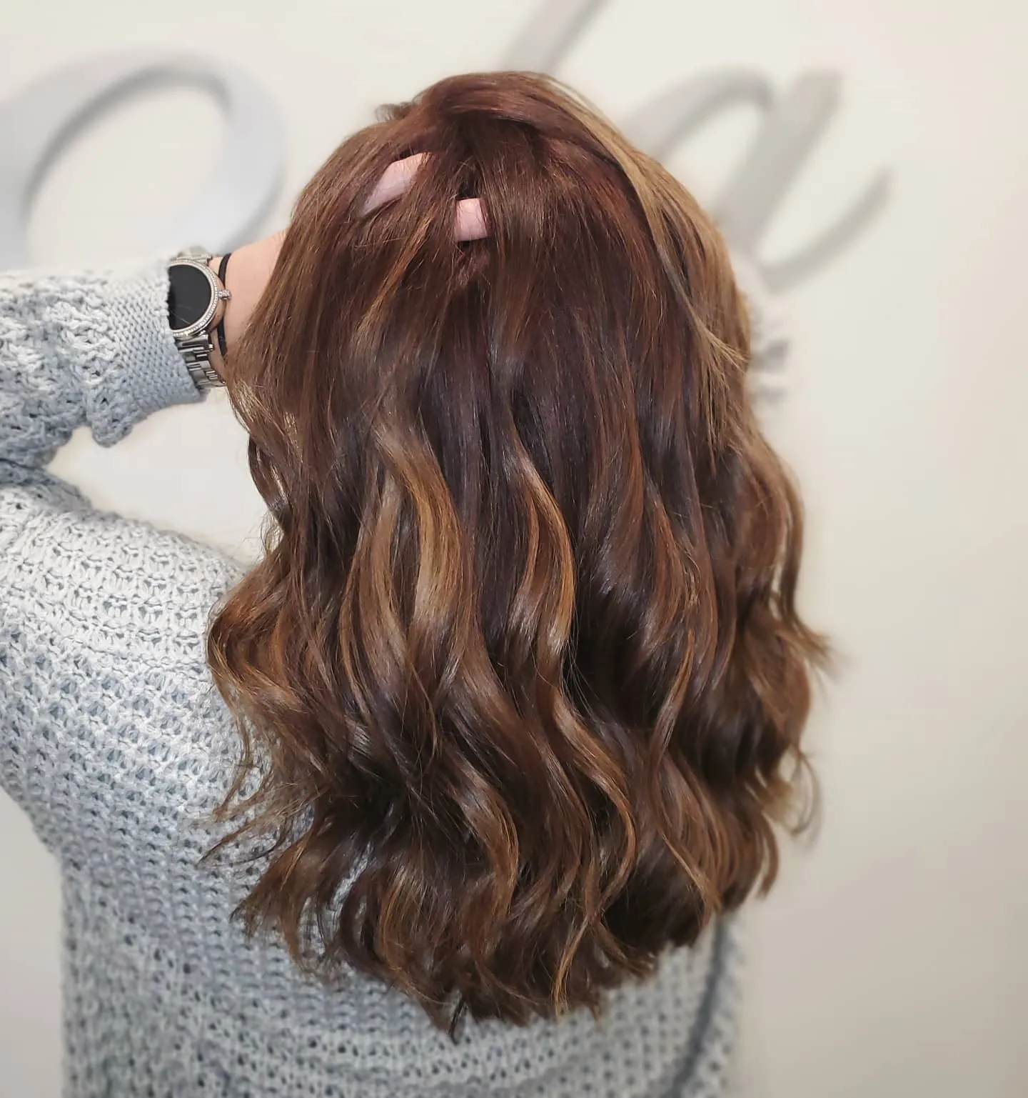 Medium rich brown with subtle highlights and soft waves