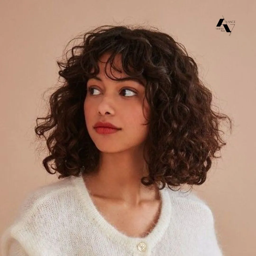 Curly bob with soft wispy bangs