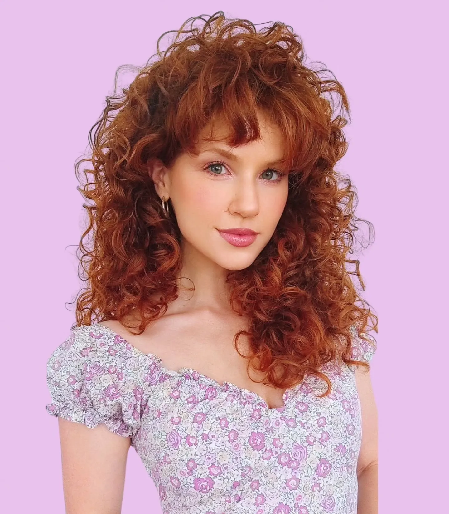 Long curly shag with full fringe and crown layers