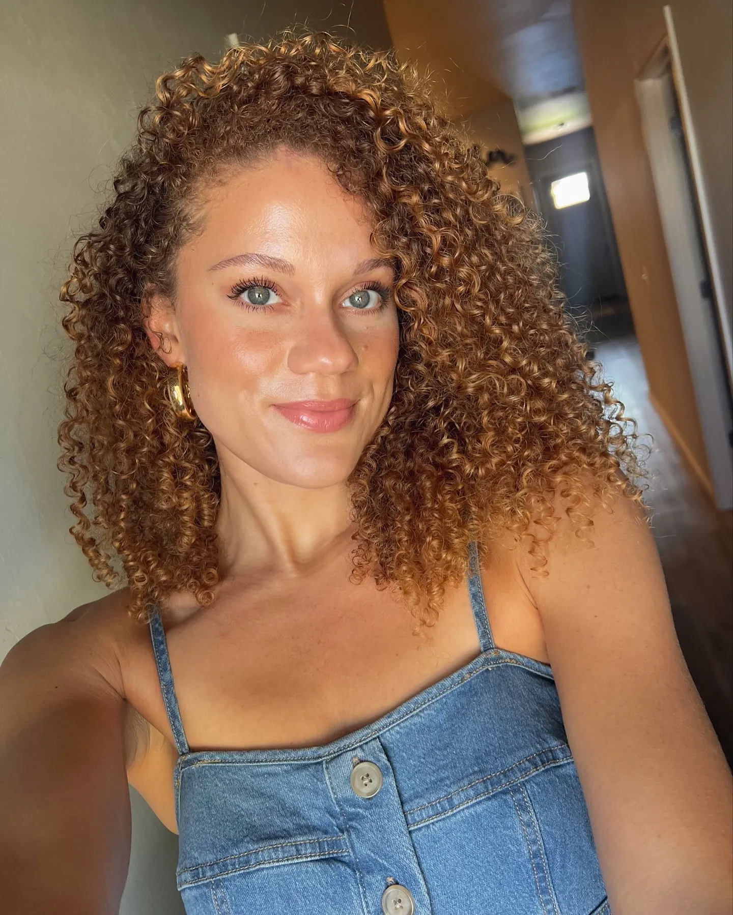 Defined shoulder-length curls with natural volume