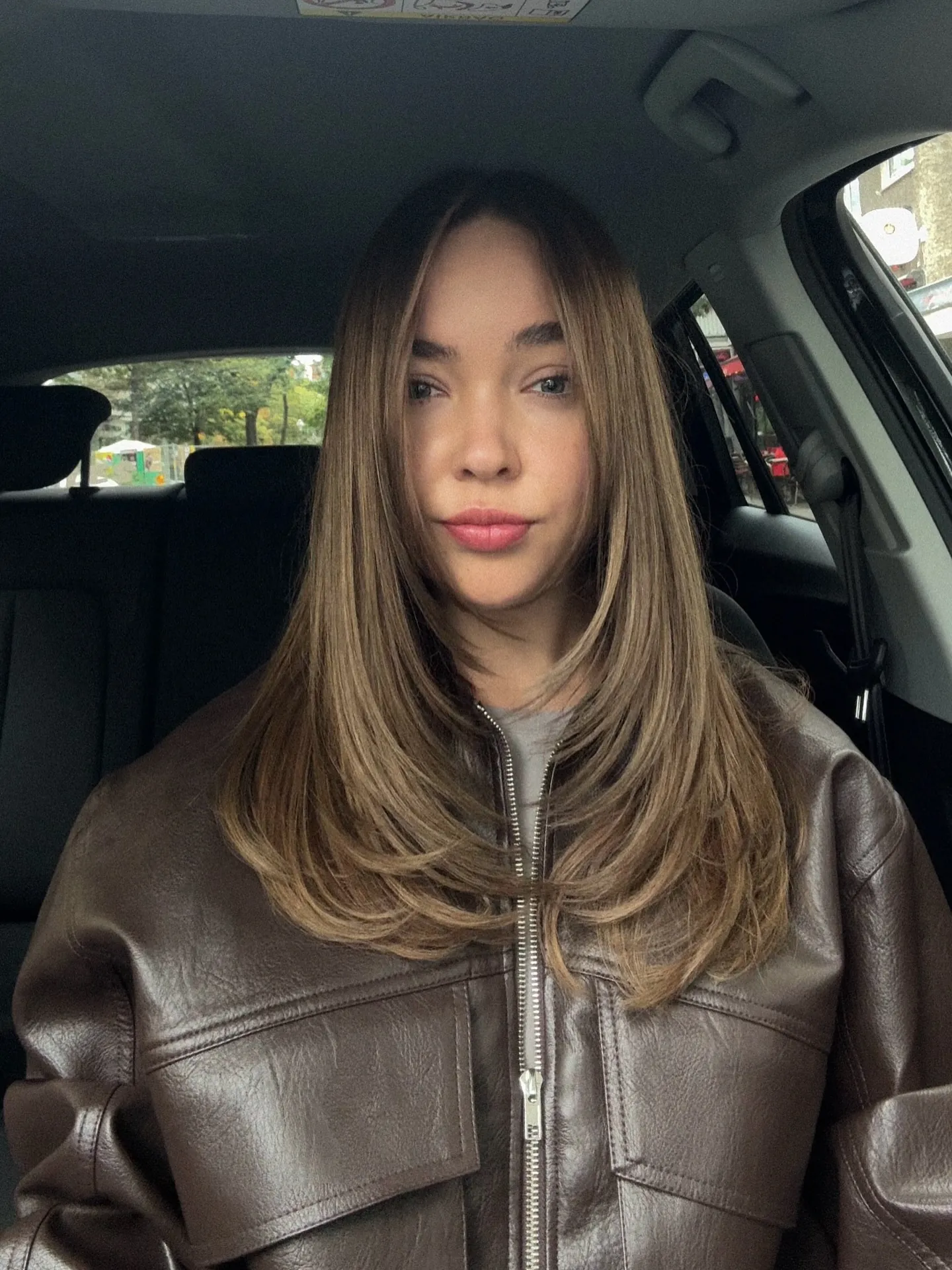 Long smooth brunette hair with lighter face-framing layers