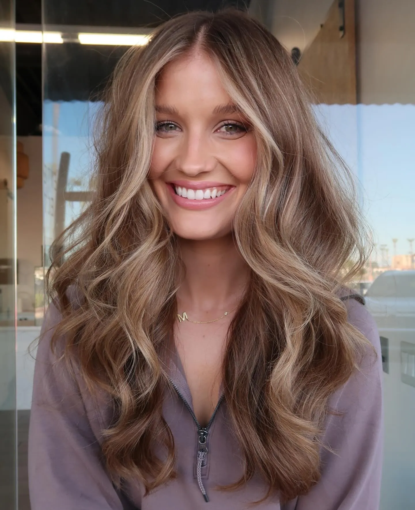 Long layered hair with soft face-framing waves