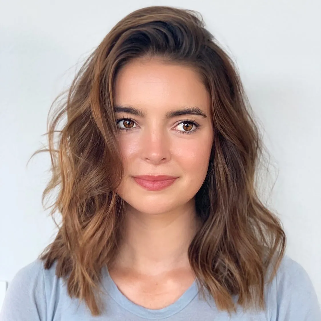 Side-part wavy lob with loose texture