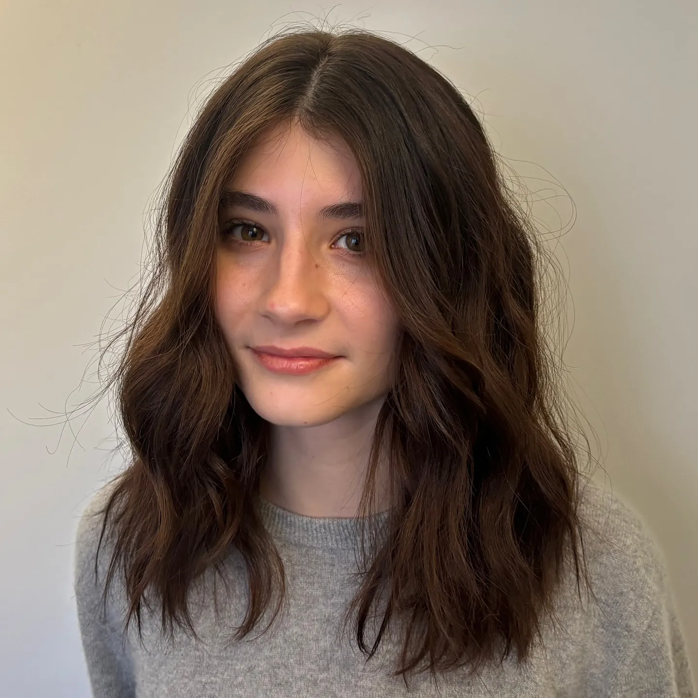 Tousled medium layers with center part