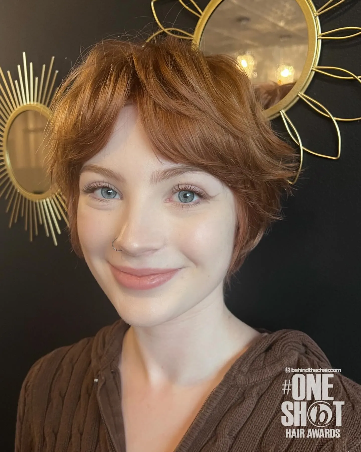 Soft copper-brown wavy pixie with bangs