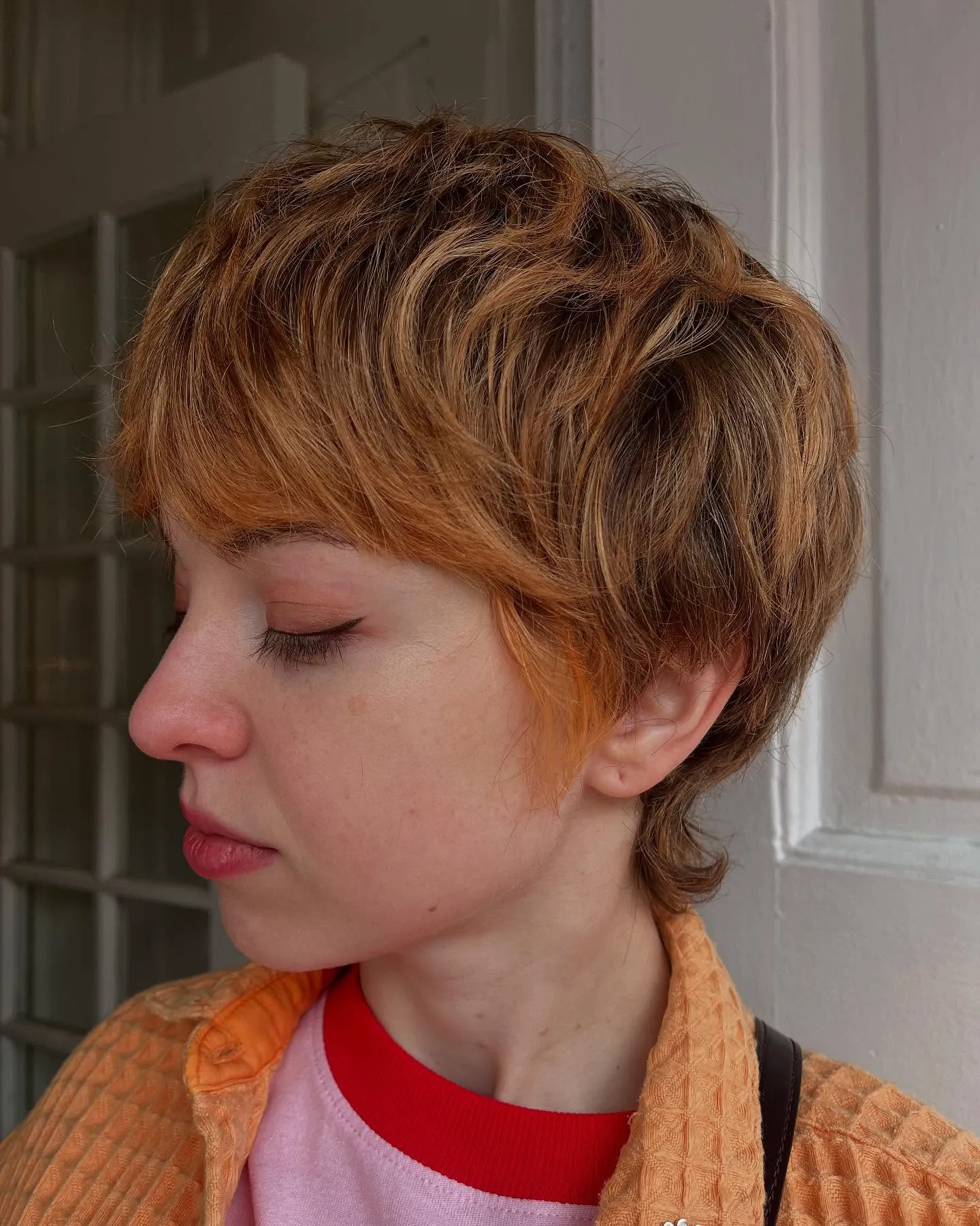 Golden copper textured wavy pixie