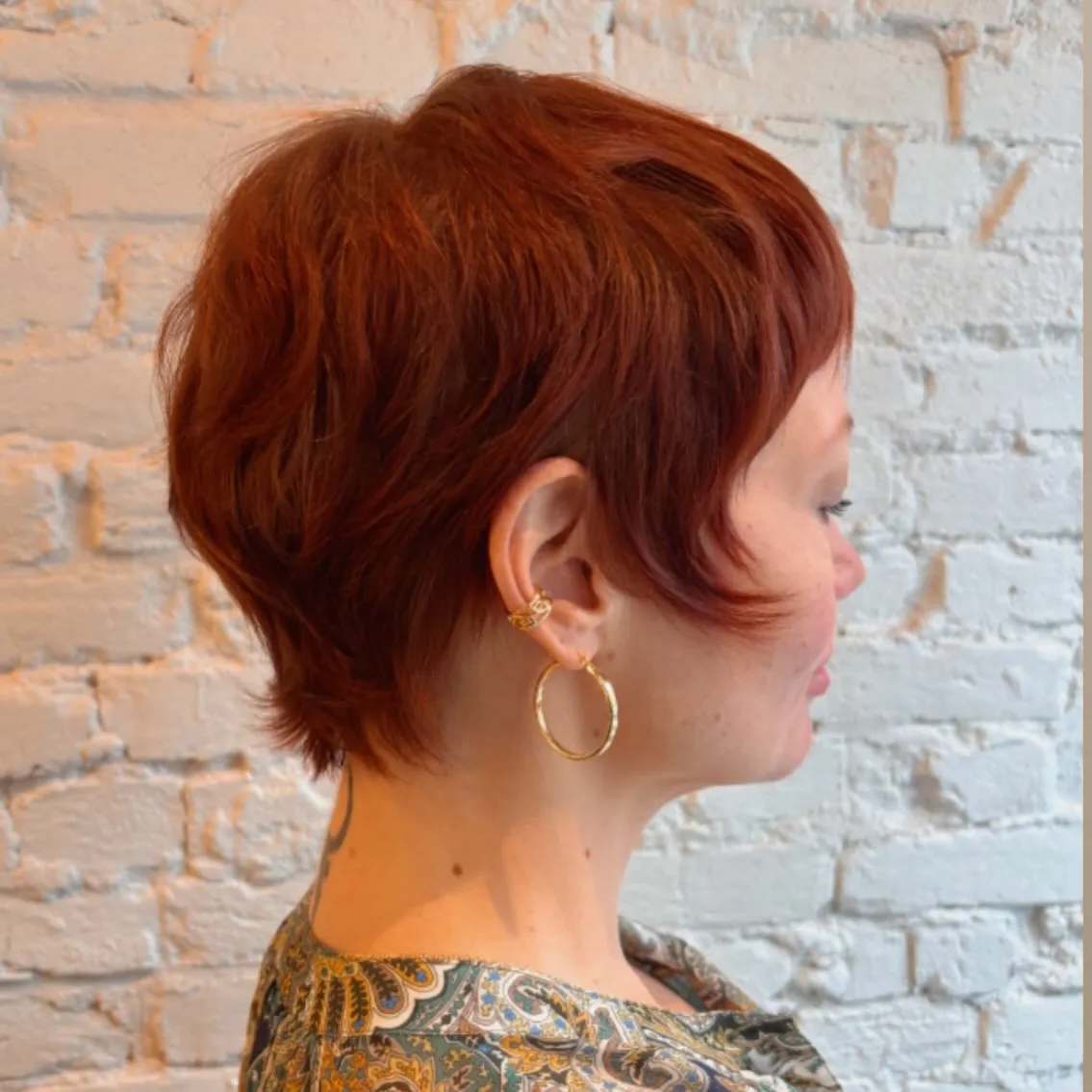 Rich copper-red short textured pixie