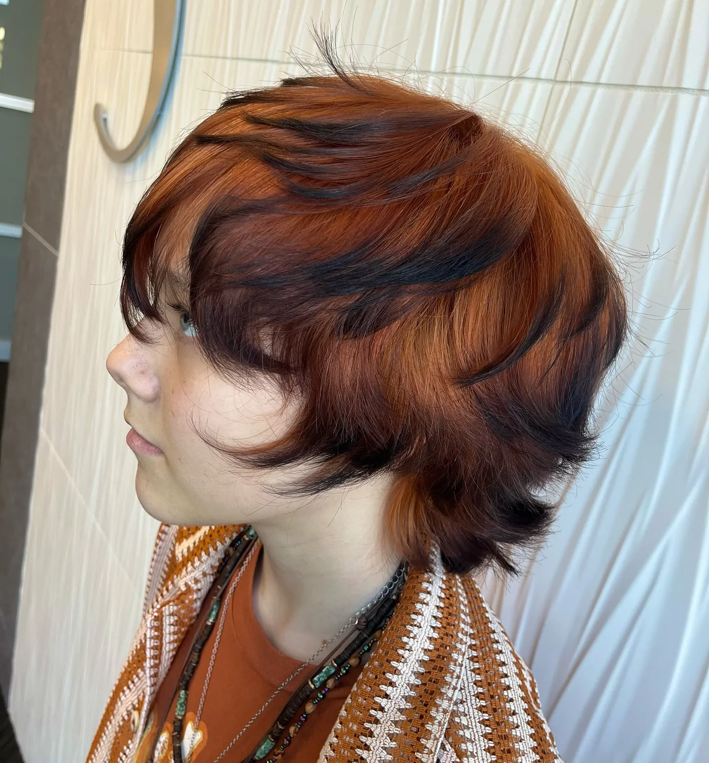 Copper-red pixie with dark underlayers