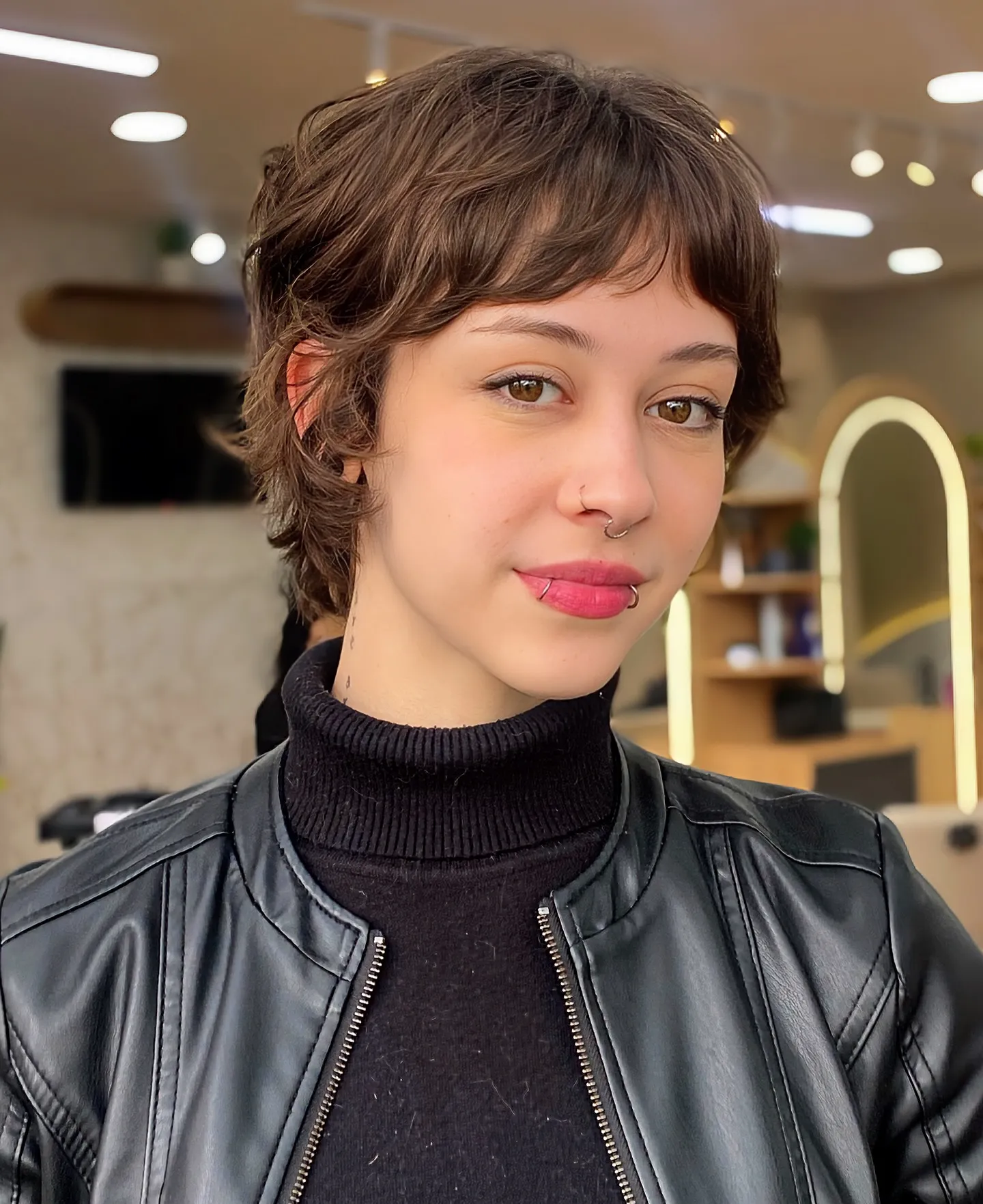 Soft brown textured pixie with bangs