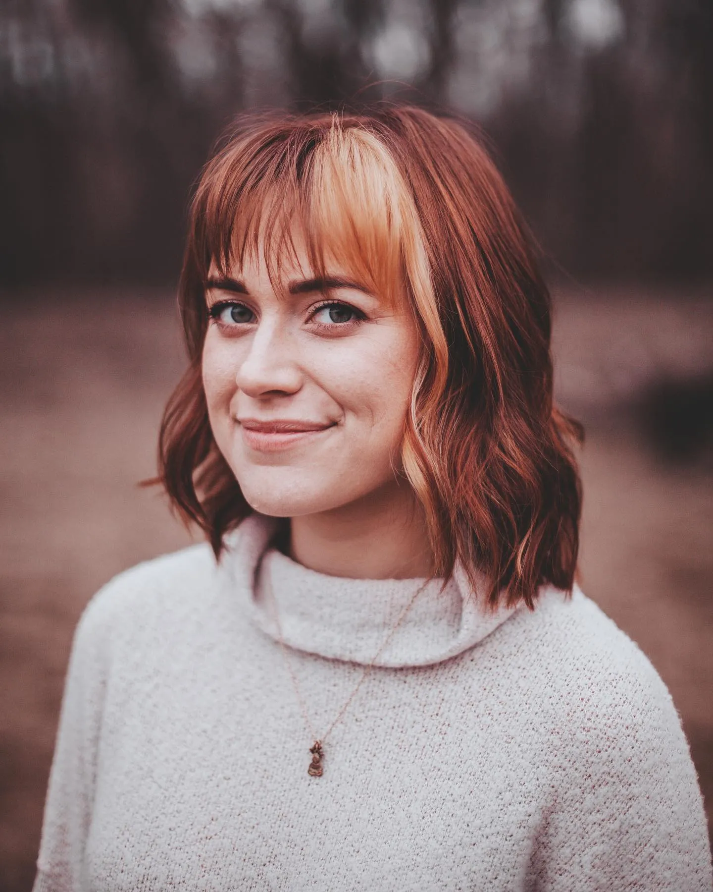 Medium copper-red with blonde bangs
