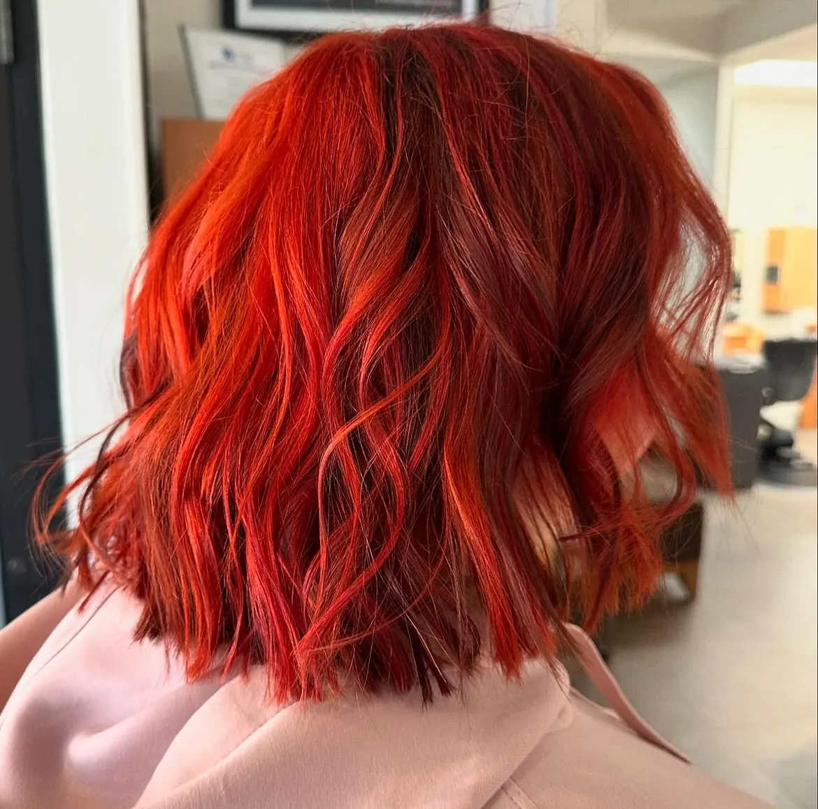 Vibrant bright red wavy bob