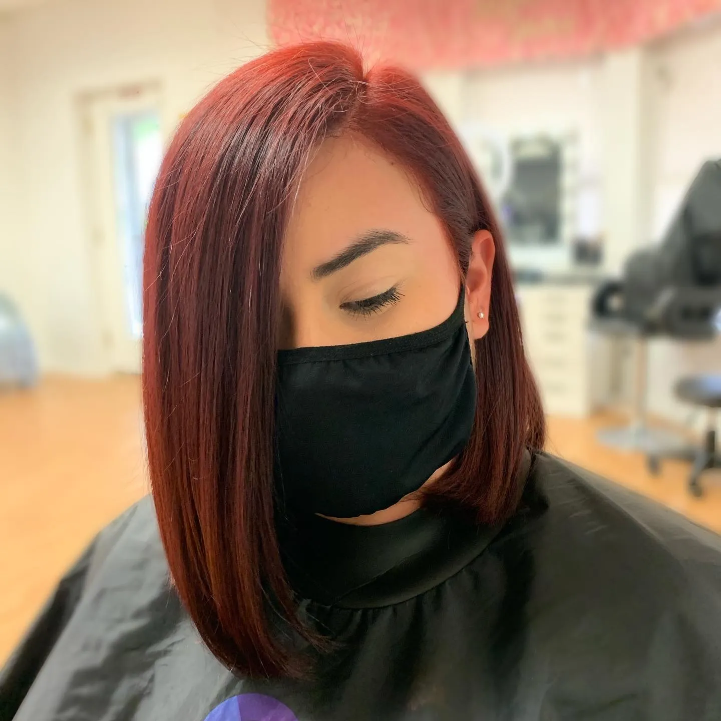 Sleek deep red bob