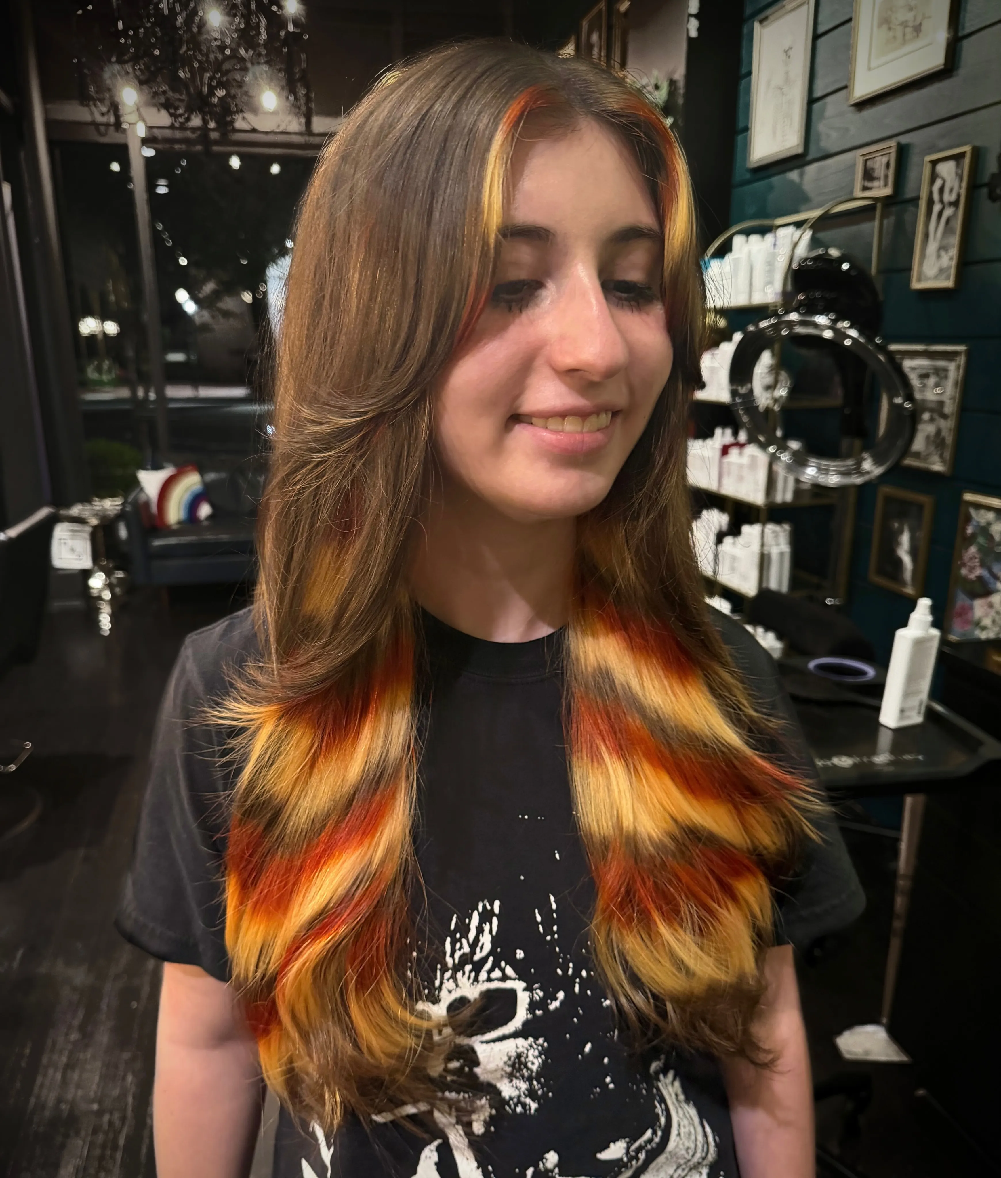 Long brown hair with red orange and yellow hidden colour layers
