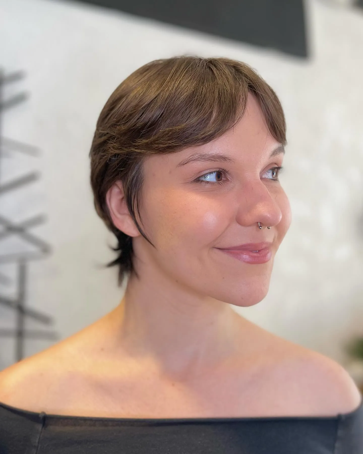 Long feathered pixie with a centre-split fringe and flicked nape