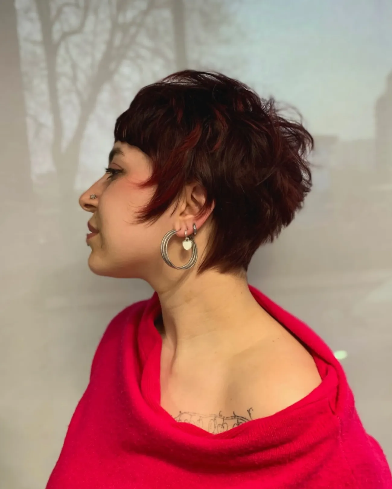 Shaggy feathered pixie with long side pieces and a textured crown