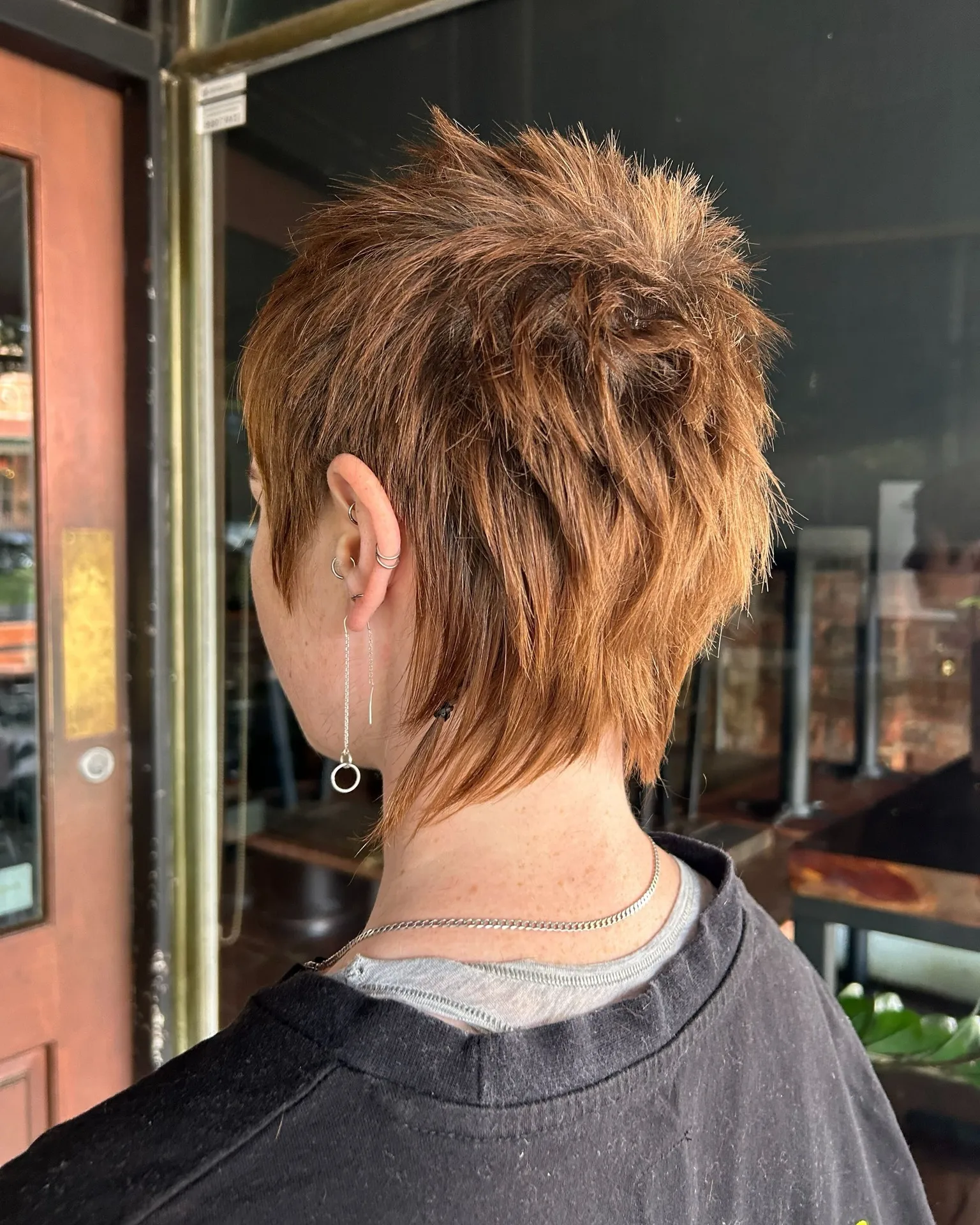 Spiky feathered pixie with a textured crown and wispy nape