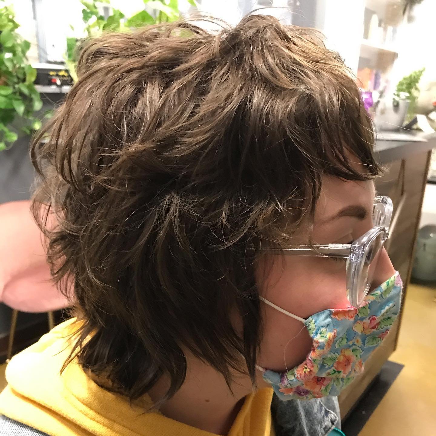 shaggy short haircut with tousled layers and side fringe