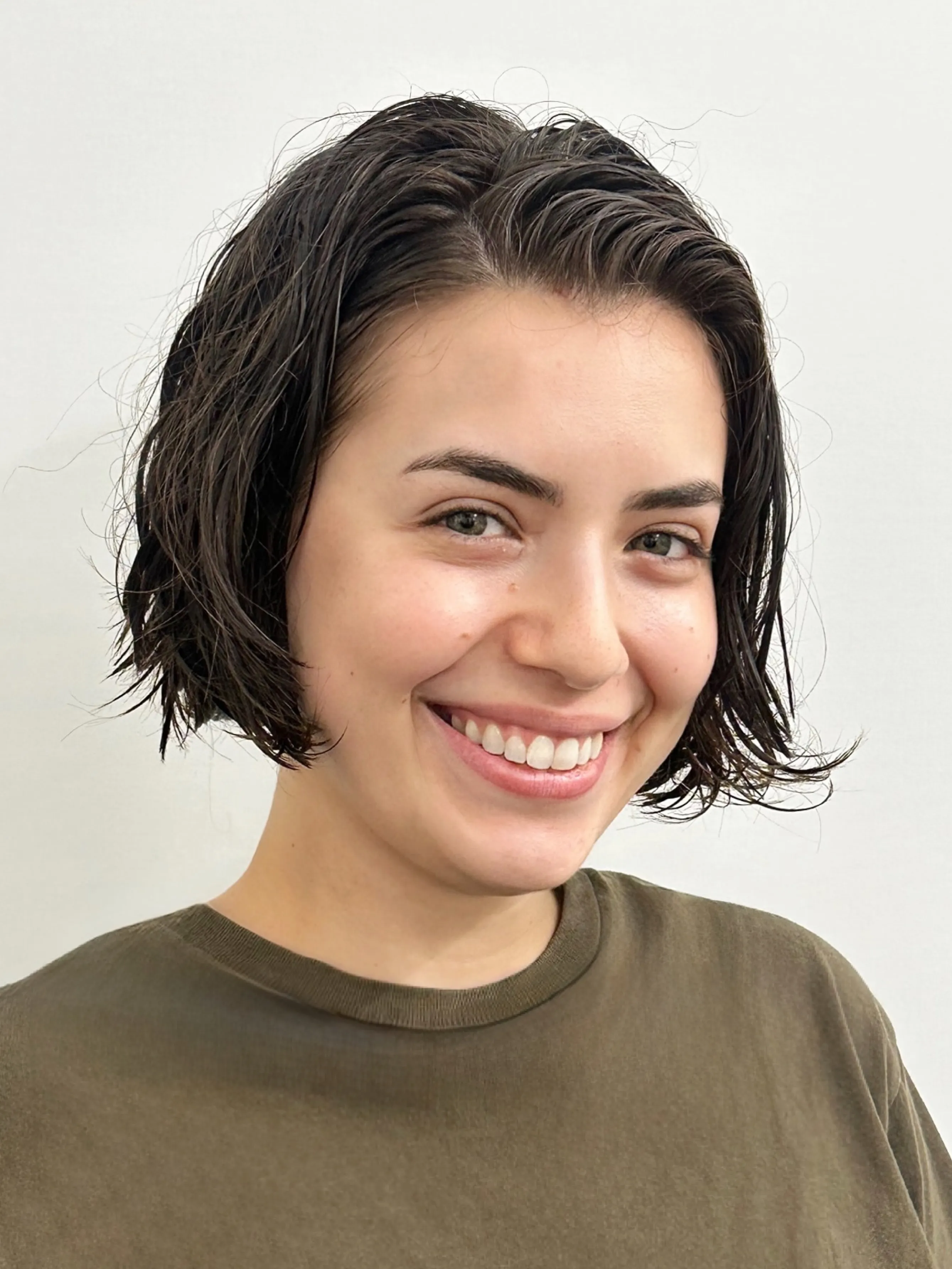 Wet-look wavy chin-length bob with a centre part