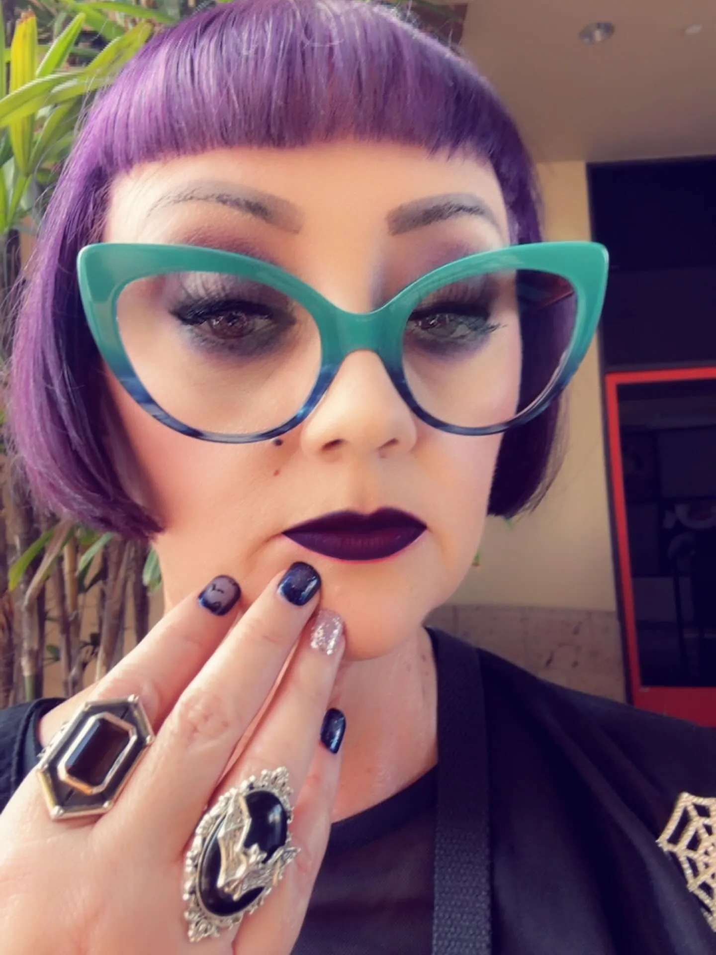 Purple precision bob with short curved fringe