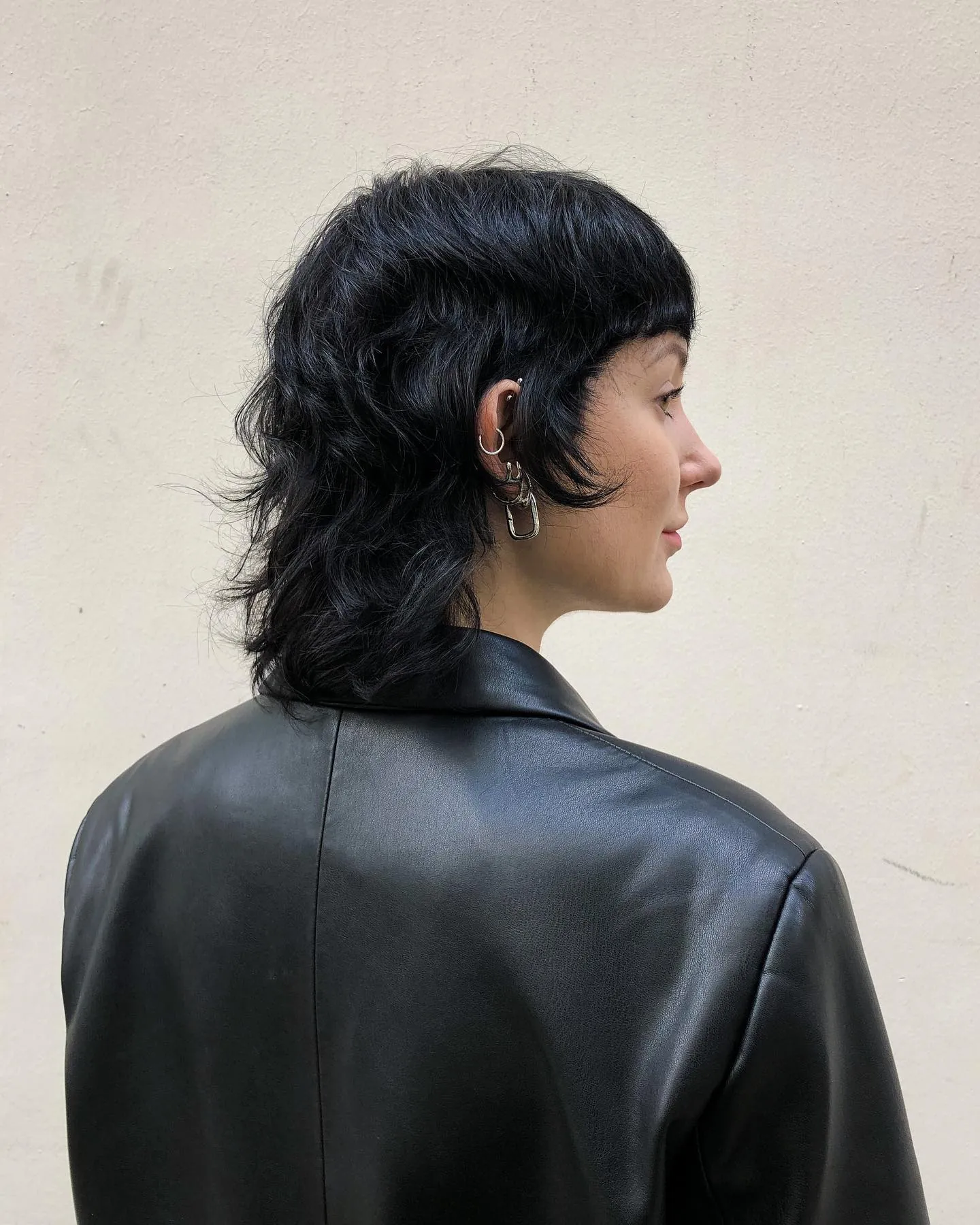 Black shaggy mullet bob with longer wispy nape