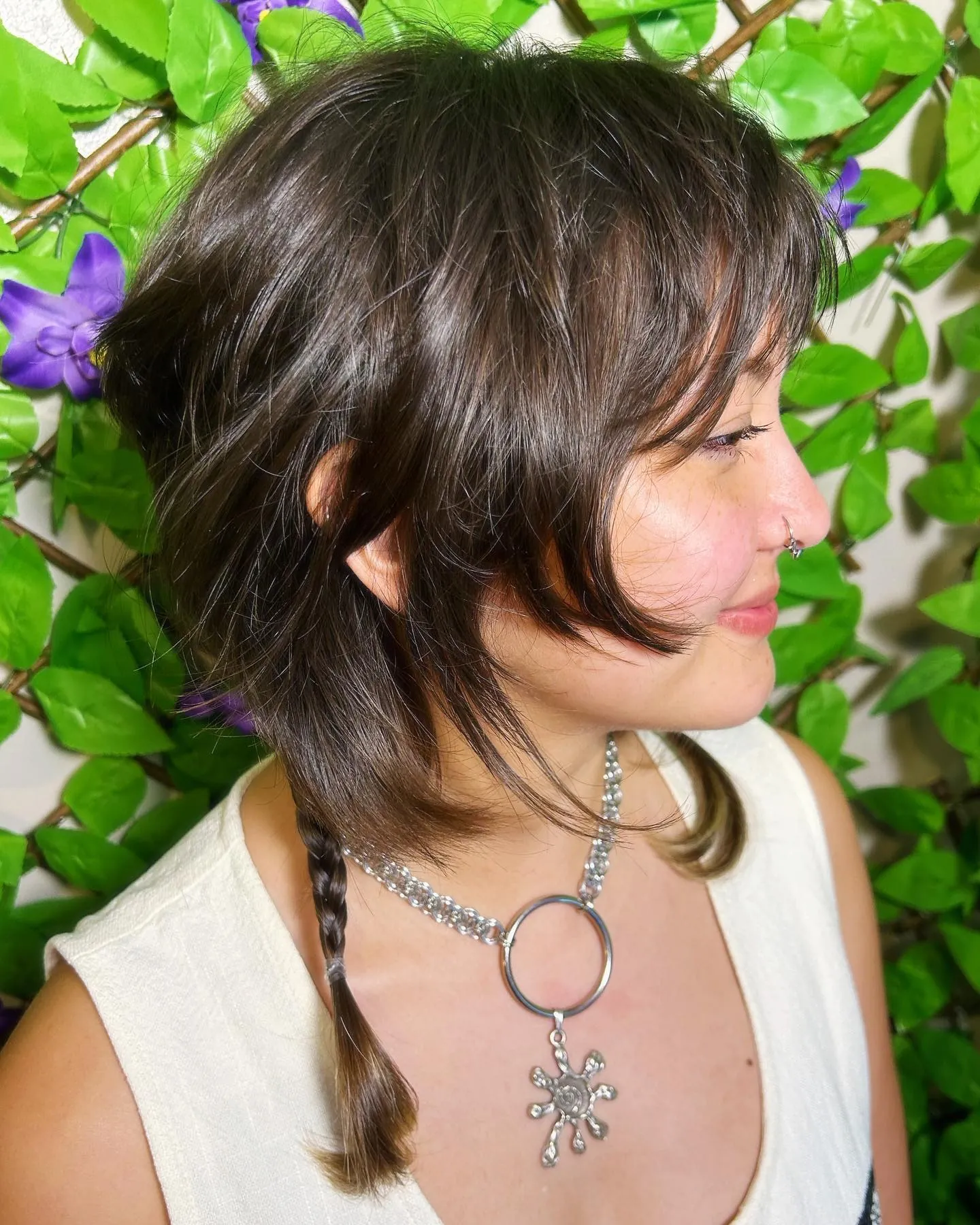 Choppy shag bob with a single narrow braid
