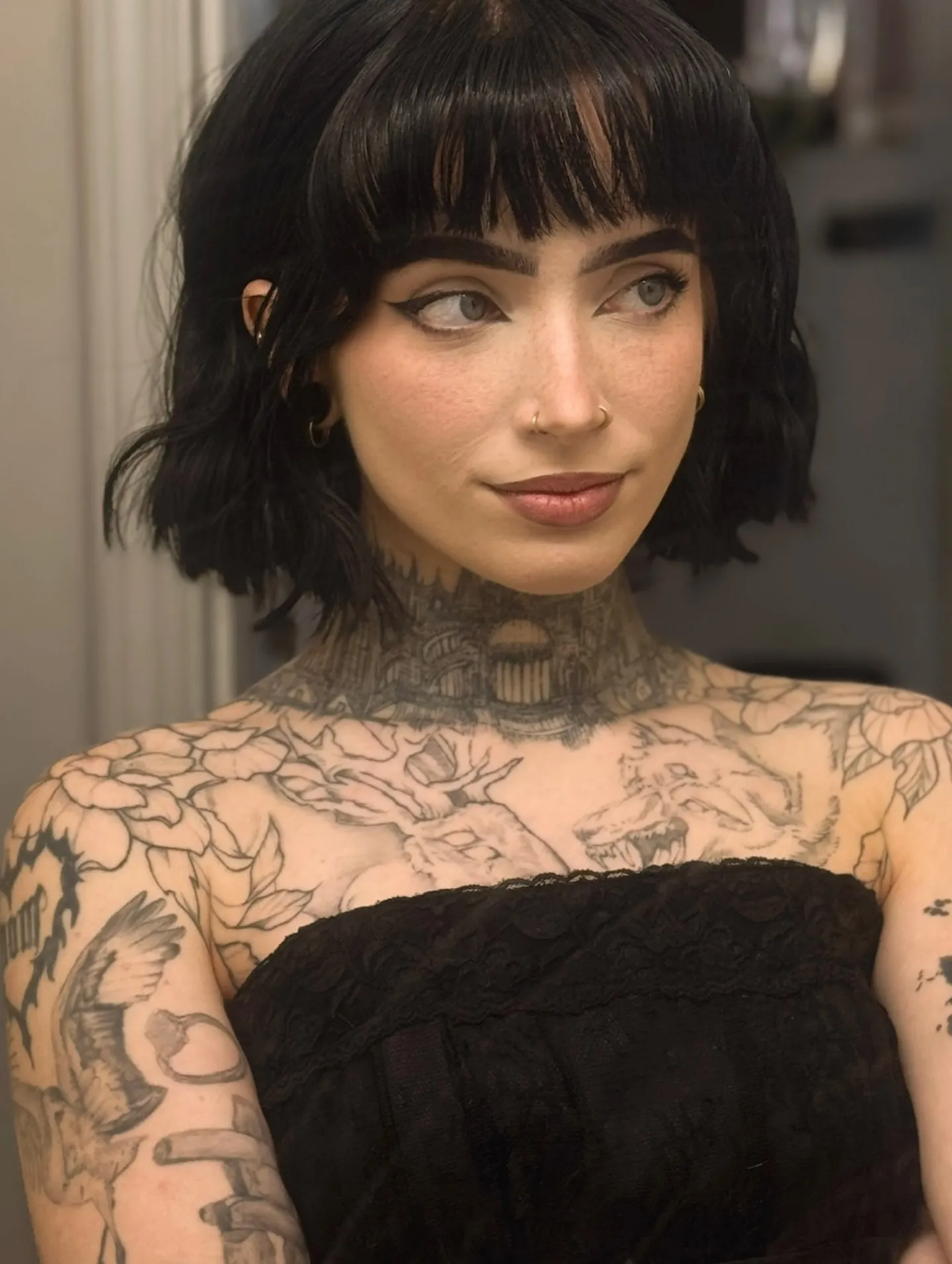 Short black blunt bob with textured separated ends