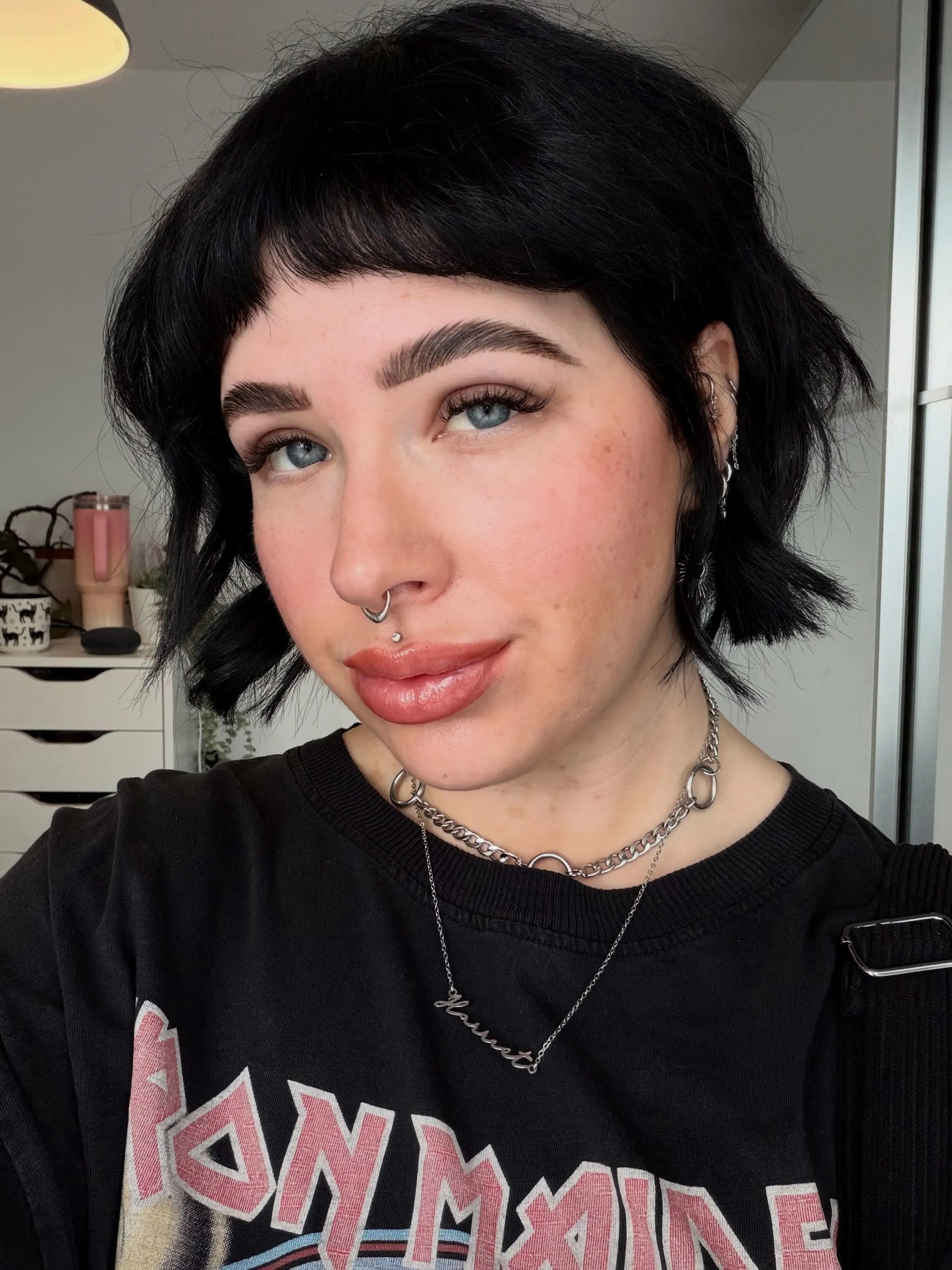Piecey black bob with short curved micro fringe