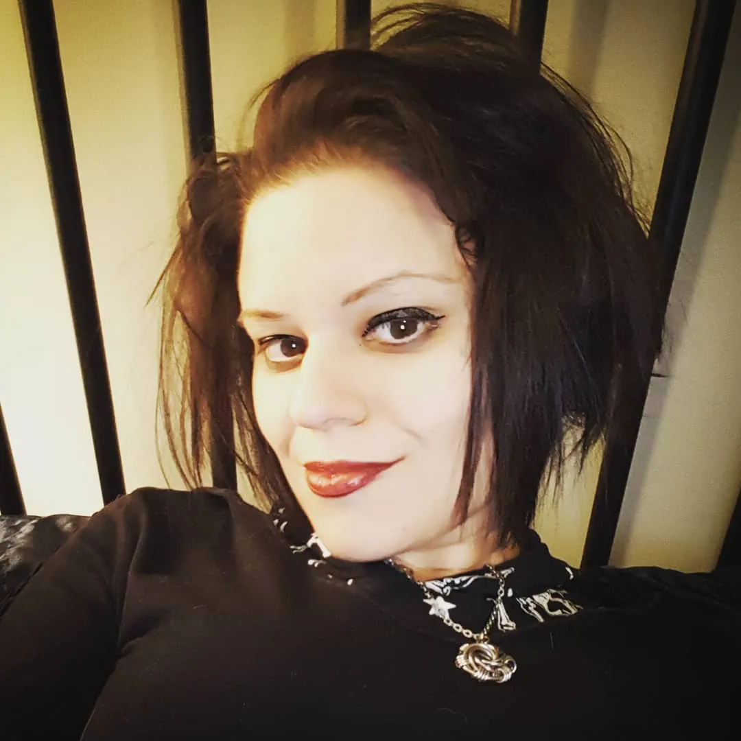 Teased black asymmetrical bob with crown volume