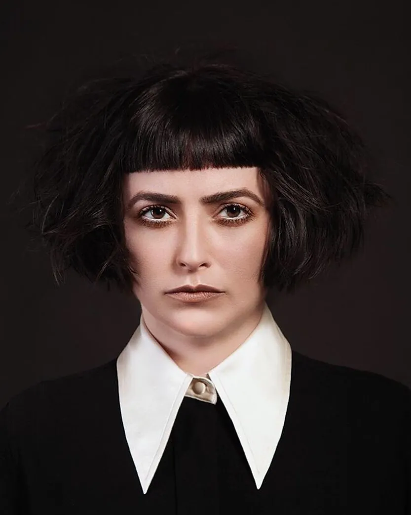 Rounded dark bob with short blunt micro fringe