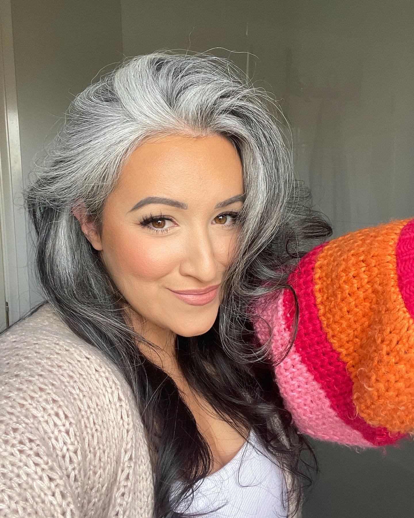 Side-swept gray waves with full volume and darker underlayers
