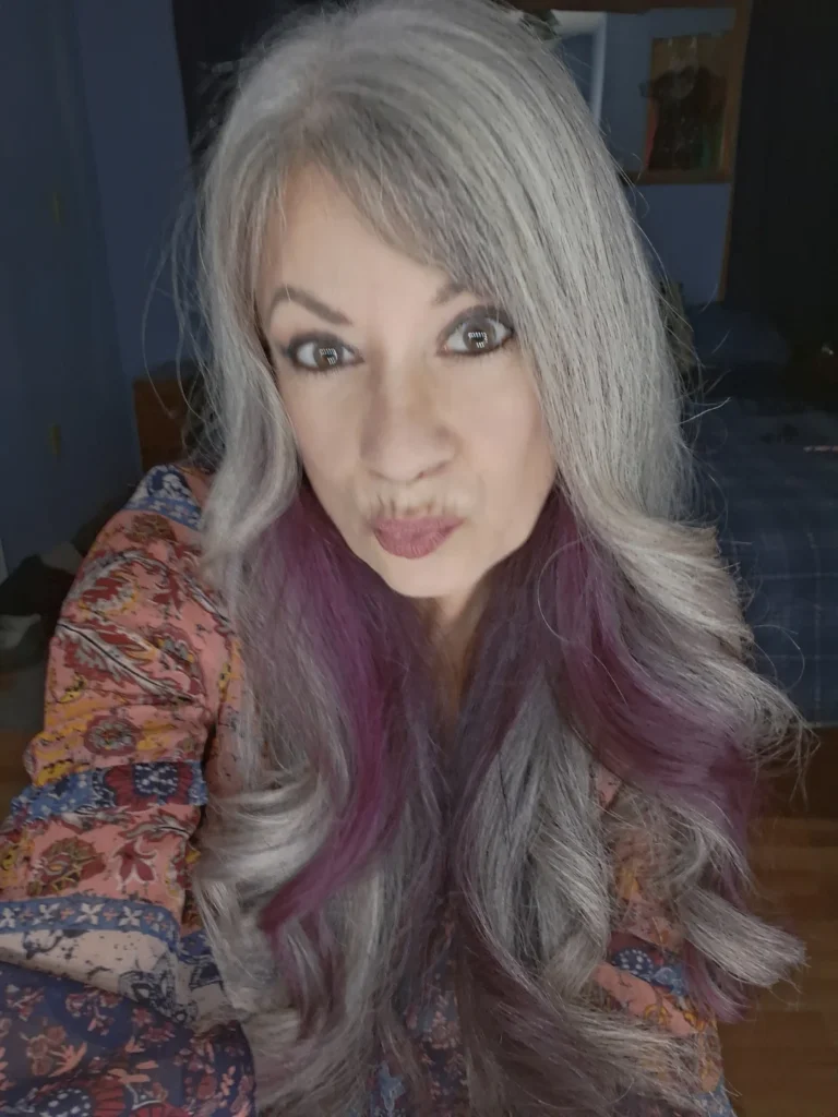 Long layered gray waves with a soft wispy fringe