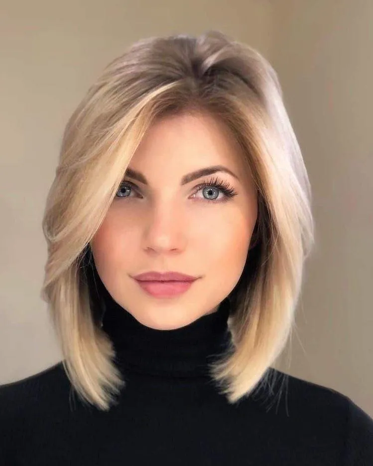 Sleek light shoulder-length lob with a deep side part