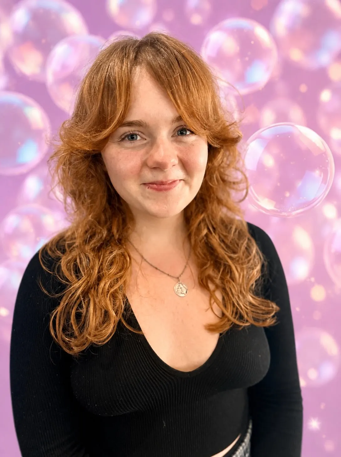 Long copper shag with curtain bangs and loose curls