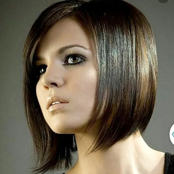 Sleek dark angled bob with a deep side part and longer front
