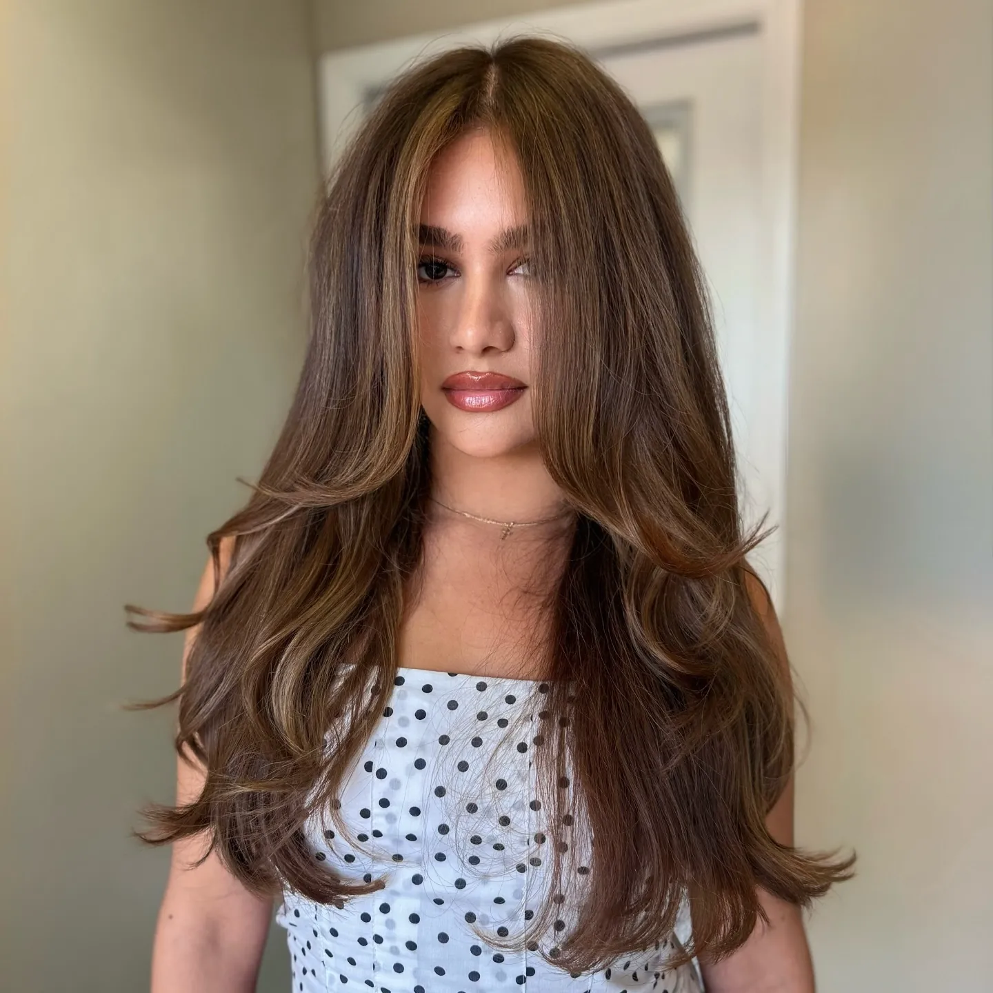 Long brunette layers with softly flipped ends