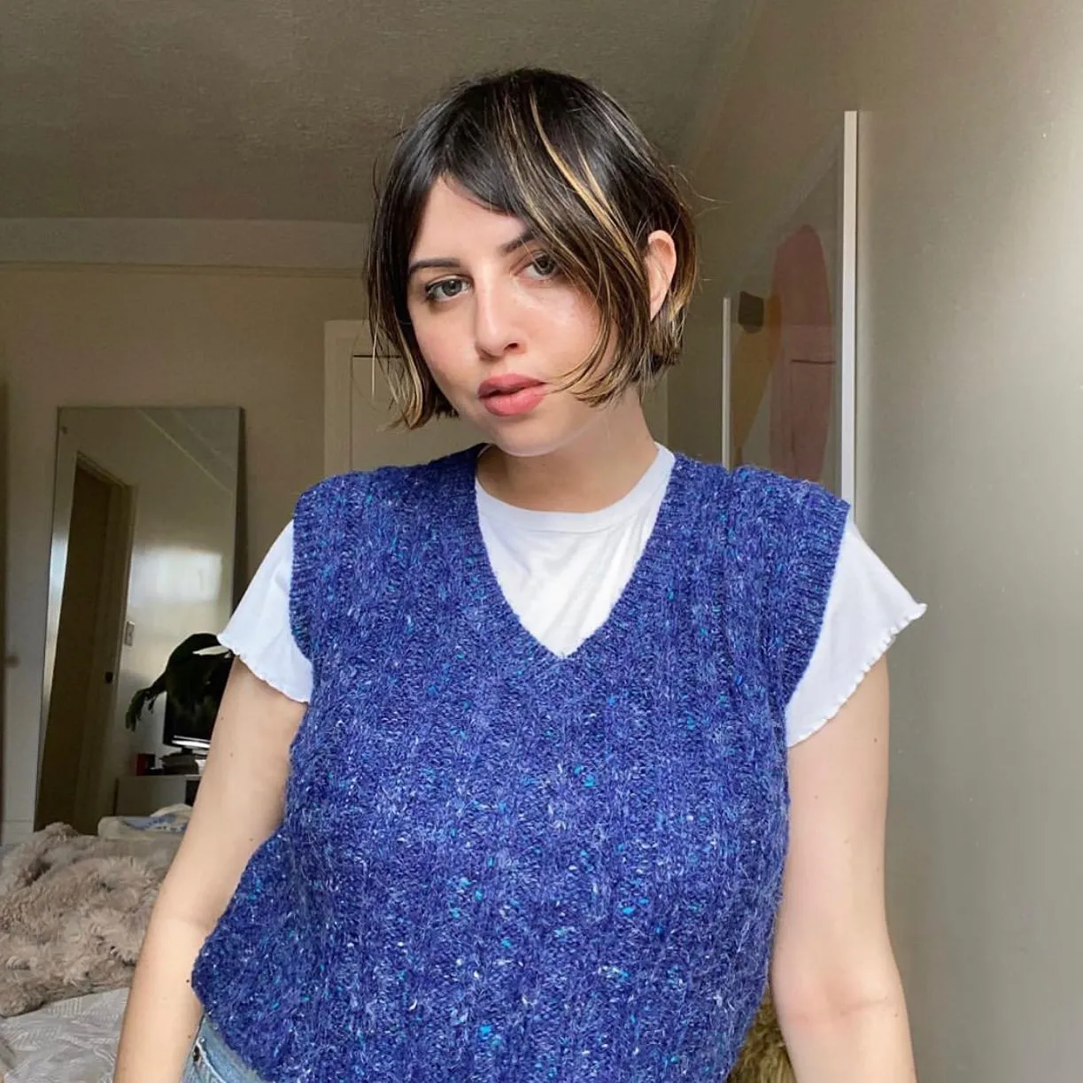 Sleek jaw-length bob with curved front pieces