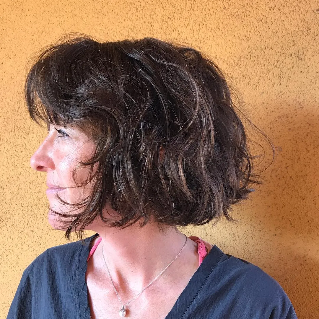Shaggy wavy jaw-length bob with full fringe