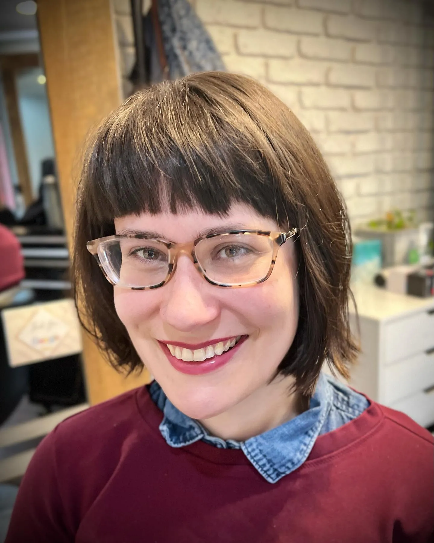 Blunt jaw-length bob with short straight fringe