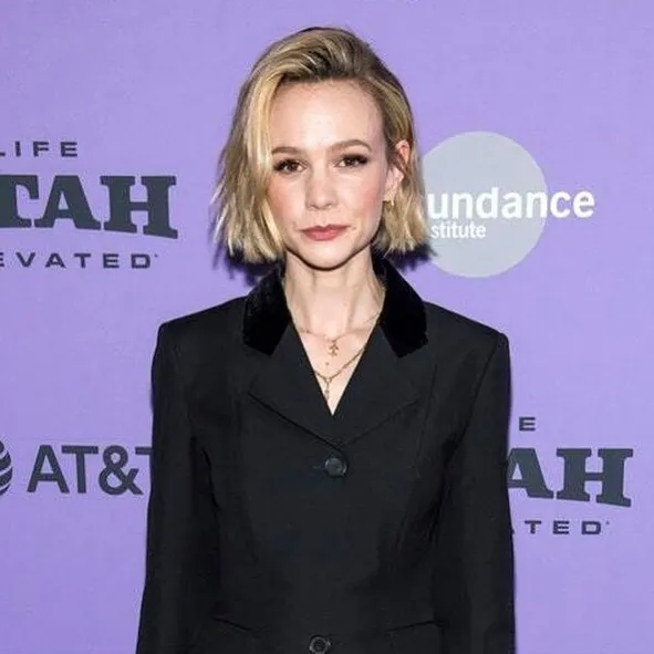 Side-parted jaw-length bob with tucked side