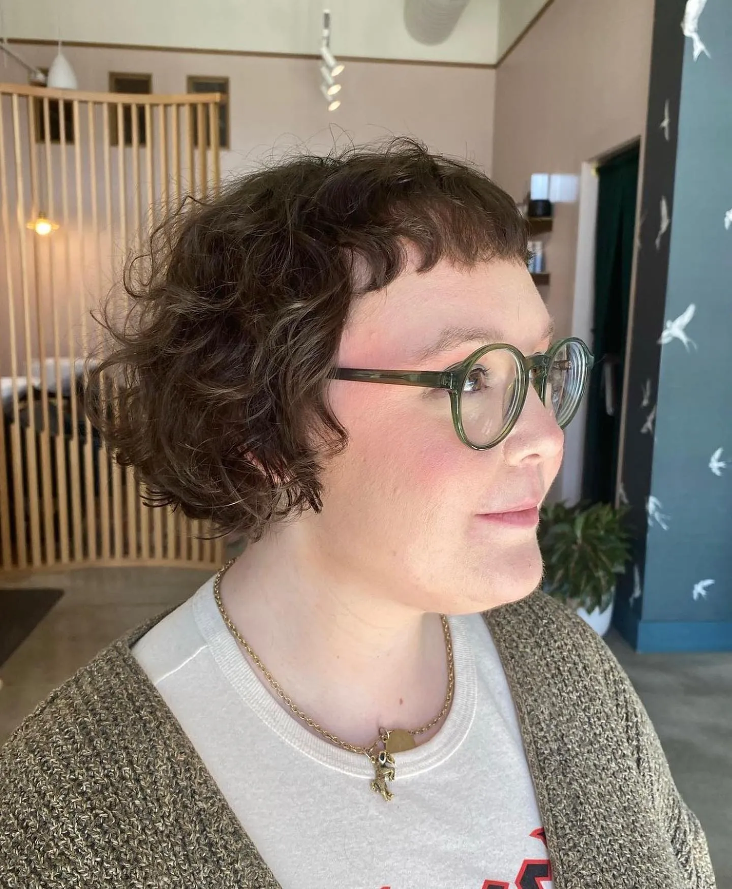 Curly jaw-length bob with short fringe